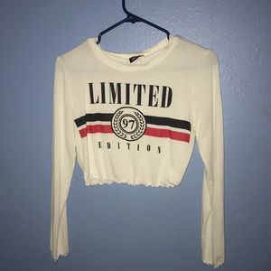 limited edition long sleeve crop top .